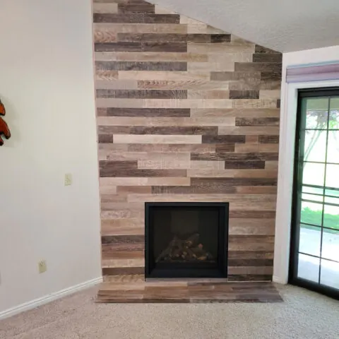 Interior Fireplace featuring fireplace masonry or surround work, suitable for warm lifestyle-focused installation content.